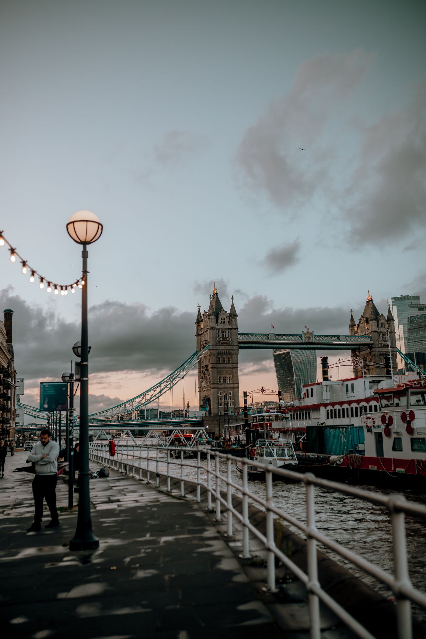 London Bridge and the Thames beneath a cloudy winter sky